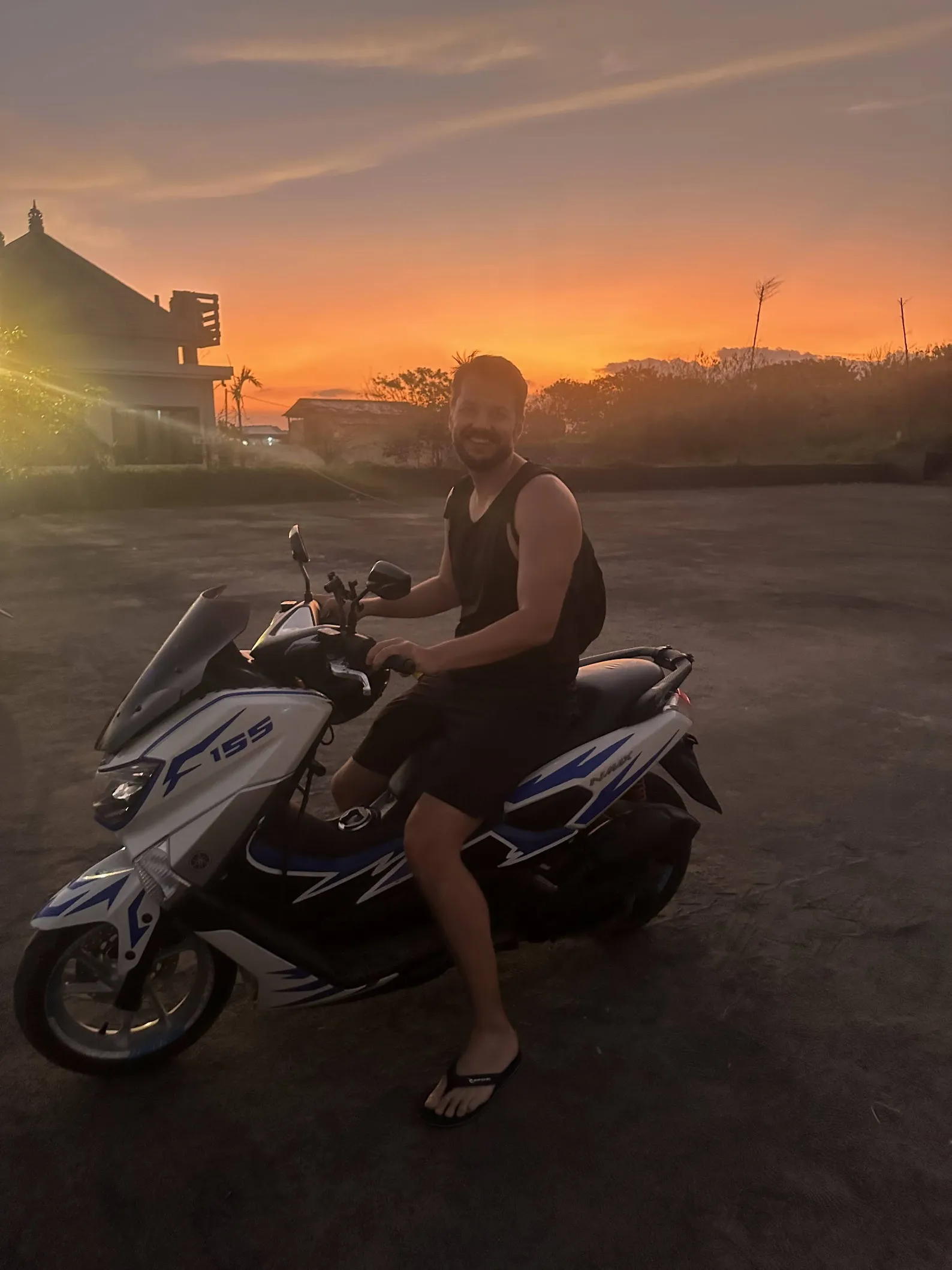 Sunset scooter ride through Bali rice fields