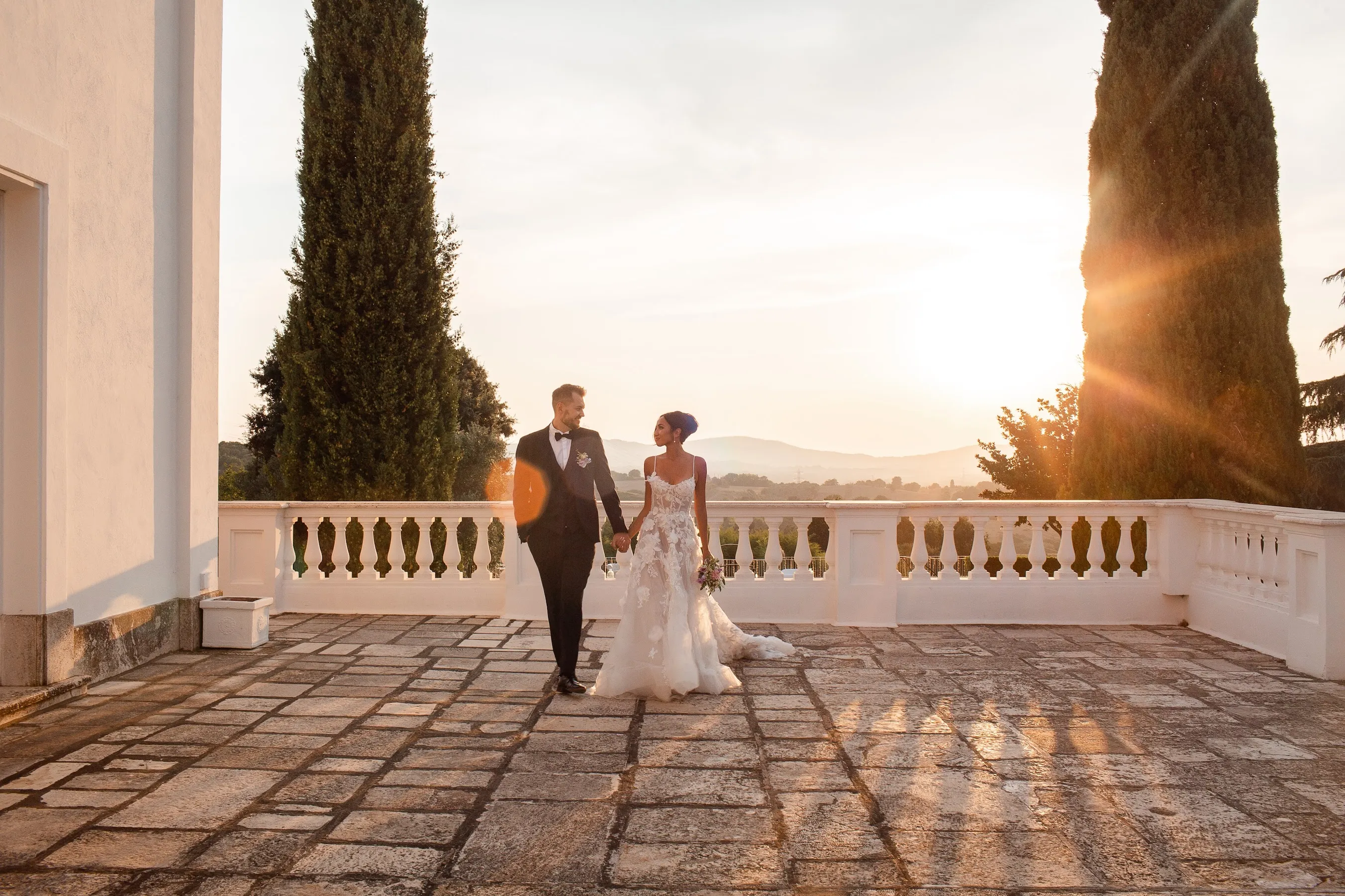 Golden sunset over our wedding venue in Italy